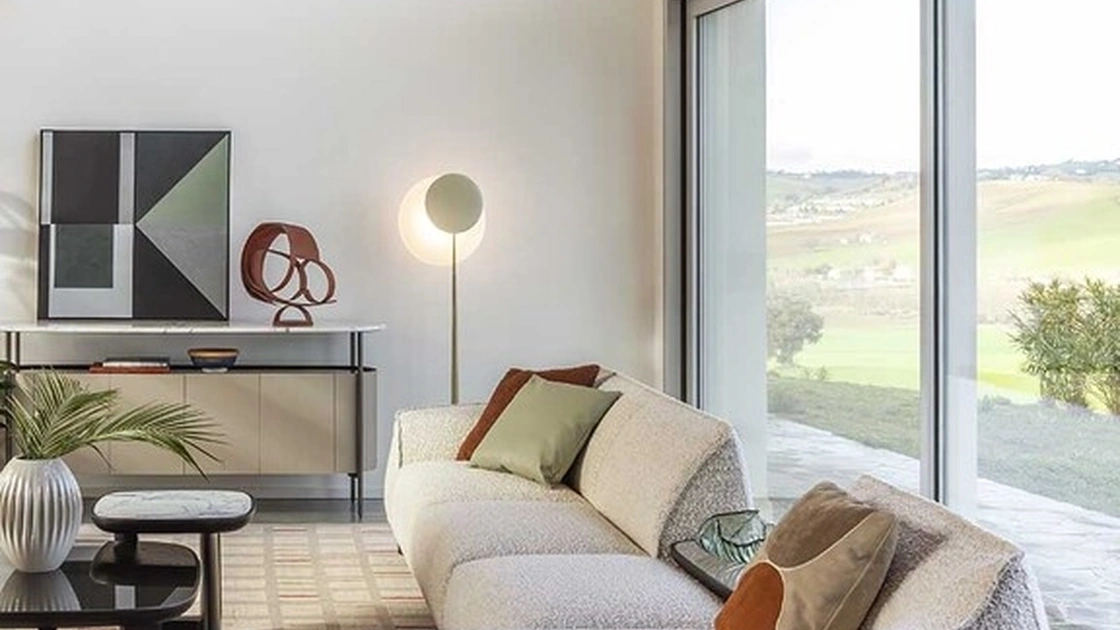 Divano Archibald Sofa System con penisola di Poltrona Frau