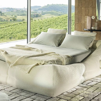 Letto imbottito Mon-Nid con box contenitore di Cassina