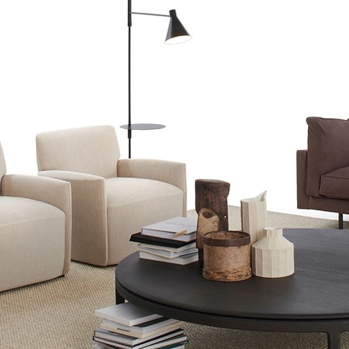 Poltroncina in tessuto Ami di De Padova