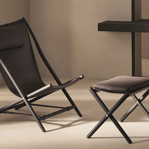 Poltrona in cuoio e legno D’Antan di De Padova