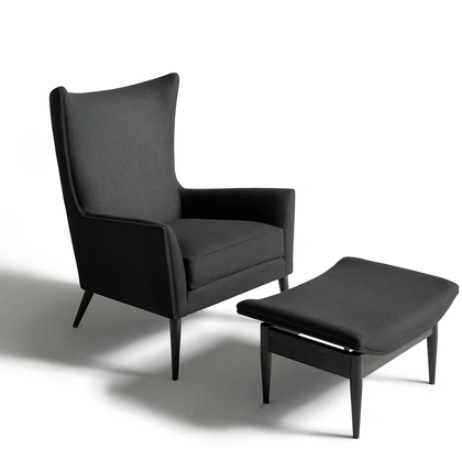 Poltrona in tessuto Wingback di De Padova