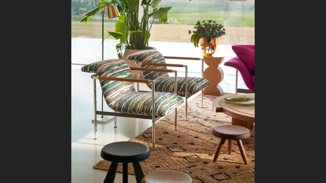 Poltroncina di design in tessuto Esosoft di Cassina