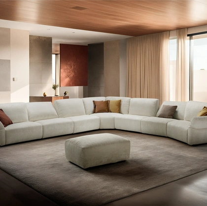 Divano angolare in tessuto Carrera di Franco Ferri